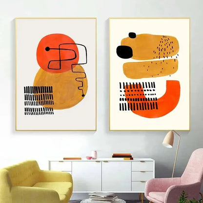 Two framed DecorBites mid century canvas prints featuring bold orange watercolor brush strokes and textured patterns