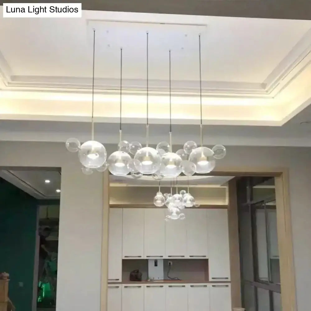 DecorBites™ minimal brass bubble pendant light with 5 clear glass heads and modern design spherical bulbs suspended by cords