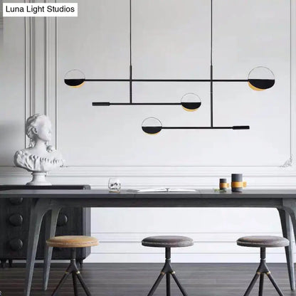 DecorBites minimalist 3-arm black gold pendant light with spherical shades for dining room island lighting