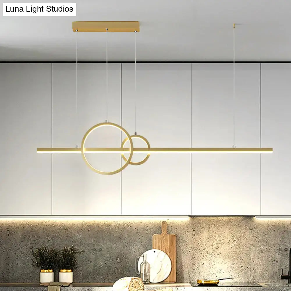 DecorBites™ minimalist gold-toned ceiling light with intersecting rings and warm third gear for kitchen island use