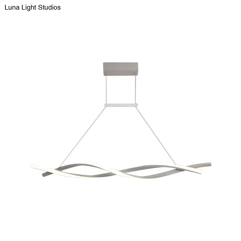 Modern silver-toned DecorBites minimalist linear pendant light with wave-shaped arms and acrylic shade for restaurants