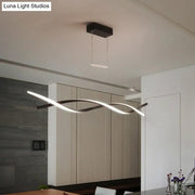 DecorBites minimalist black and grey pendant light with sleek wave-like acrylic shade for restaurant lighting
