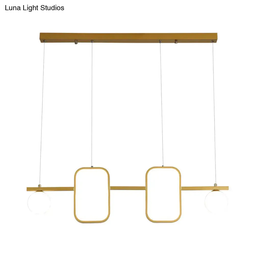 Modern gold-toned minimalist metal pendant light with symmetrical geometric LED design and cream glass shade for dining room, color remote control compatible
