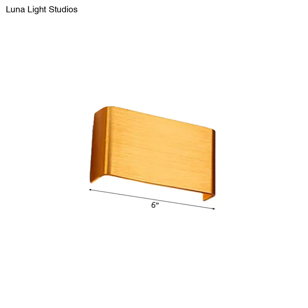 Gold-finished brushed metal wall lamp with sleek rectangular design 6-inch length for living room warm white light