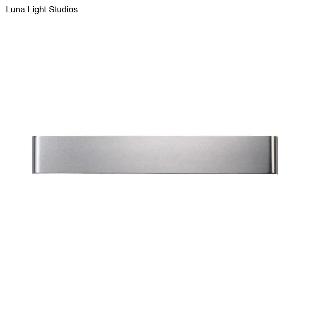 Minimalist black and silver led wall lamp with sleek stainless steel money clip design for living room warm white light