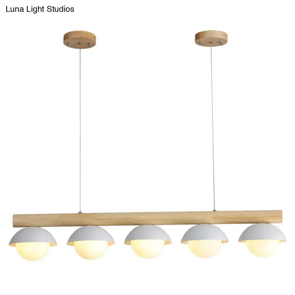 Decorbites minimalist wood island pendant with natural wood bar and five matte grey dome shades suspended by cords