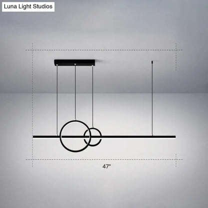 Black minimalist acrylic led ceiling light with sleek circular rings and horizontal bar by luna light studios for dining room