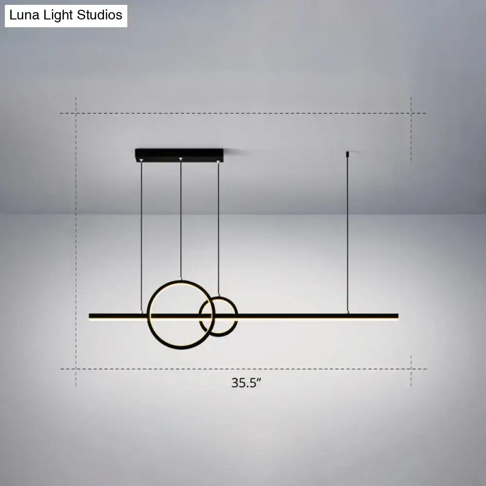 Modern black and gold acrylic ceiling light with minimalist circular pendant design for dining room decorbites suspension