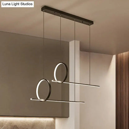 Black minimalistic iron pendant light fixture with two glowing circular rings for modern ceiling light decor