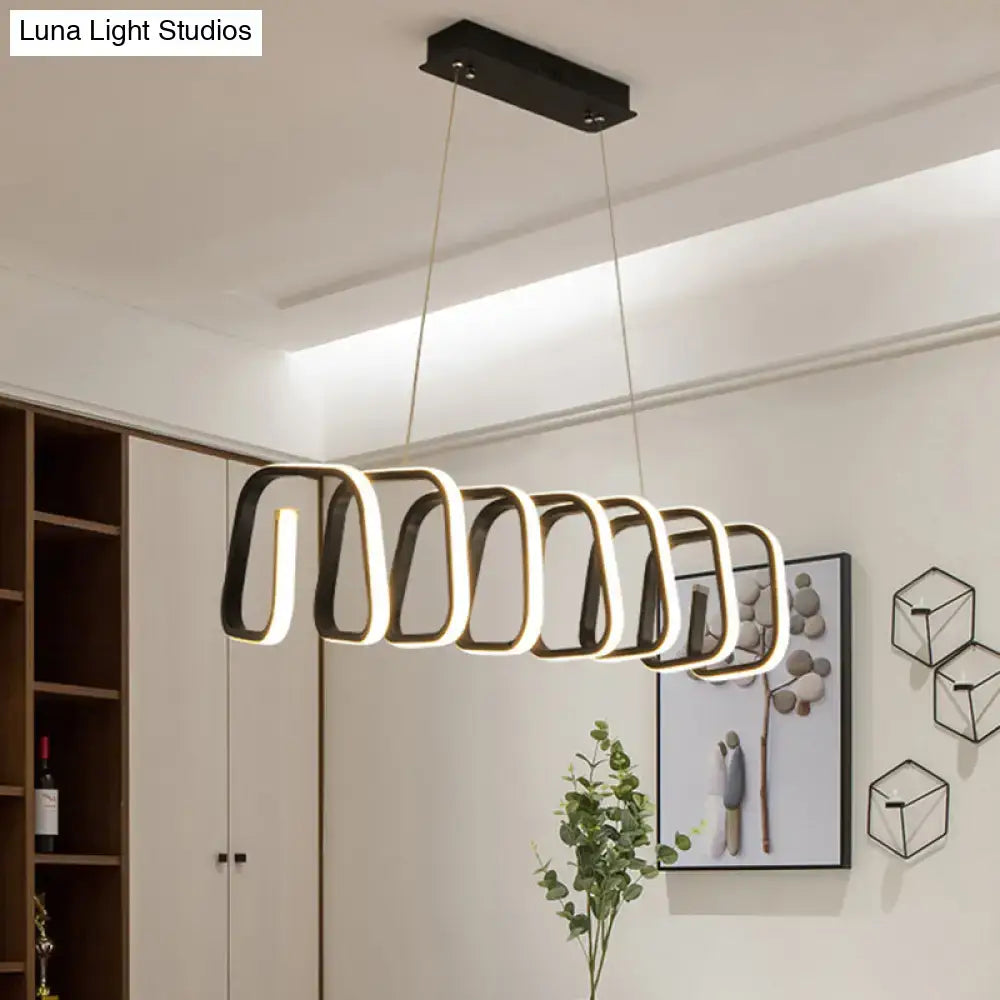 Modern black metal led island light fixture with glowing oval rings for dining room ceilings by decorbites