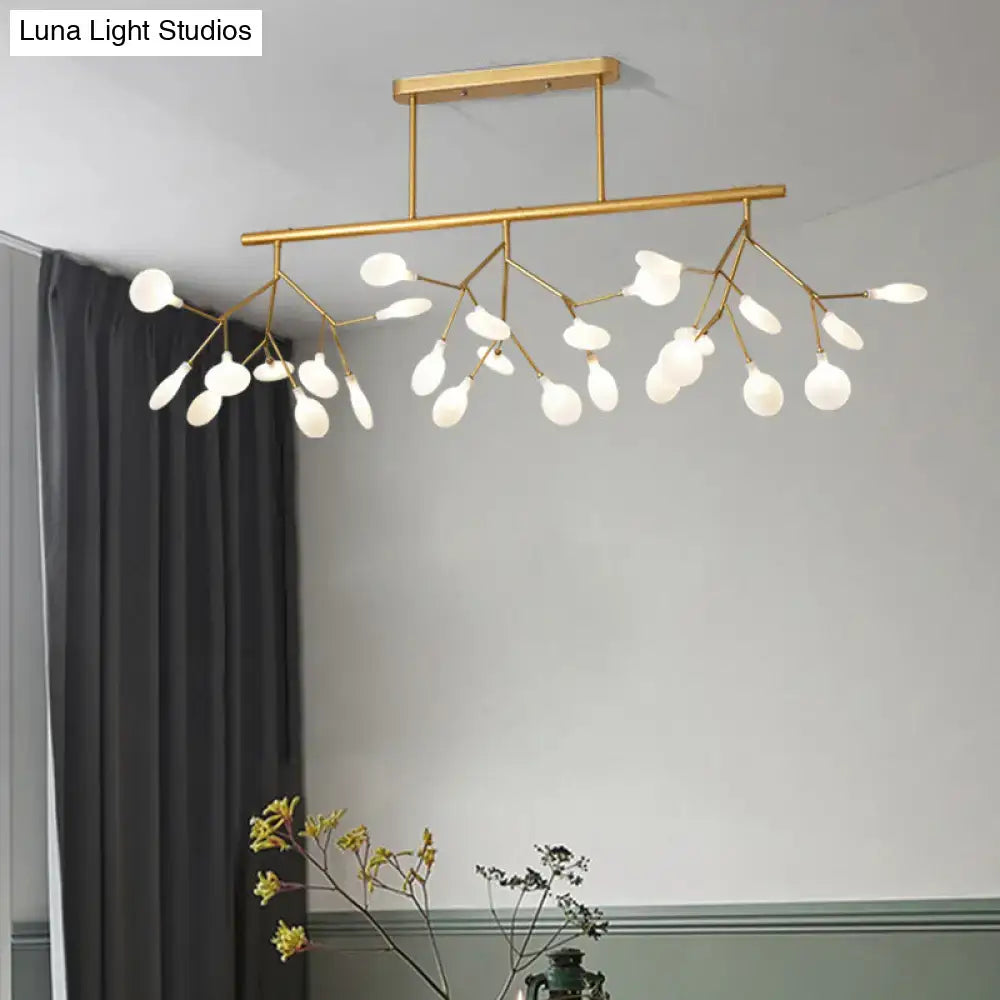 Gold-toned modern acrylic firefly island pendant with frosted glass globes for dining room lighting with 27 lights