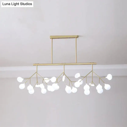 Gold-toned DecorBites™ modern acrylic led pendant light fixture with 27 heads and frosted glass globes for living room