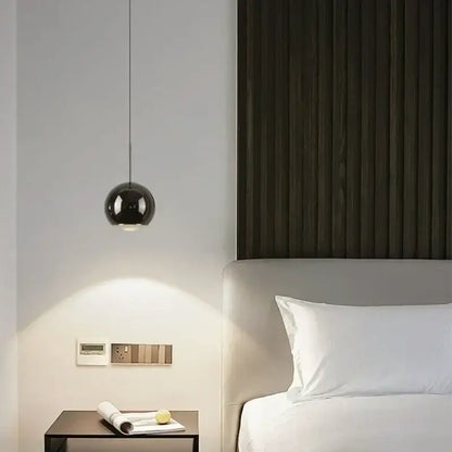 Decorbites™ modern adjustable led pendant light black spherical with polished metallic finish hanging from ceiling