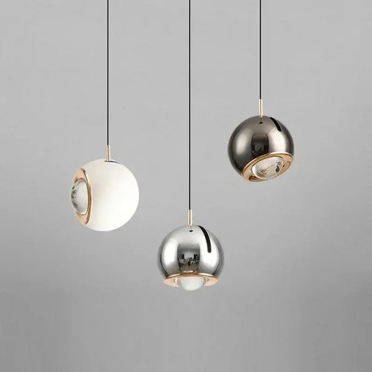 DecorBites™ modern adjustable led pendant light featuring three polished metallic spherical lights with gold accents