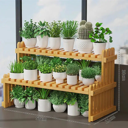 Light brown bamboo decorbites™ modern two-tier plant display stand with picket fence design holding white ceramic pots