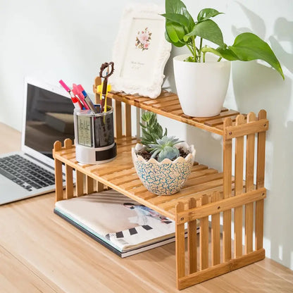 Light brown bamboo two-tier plant display stand with picket fence design from decorbites modern collection