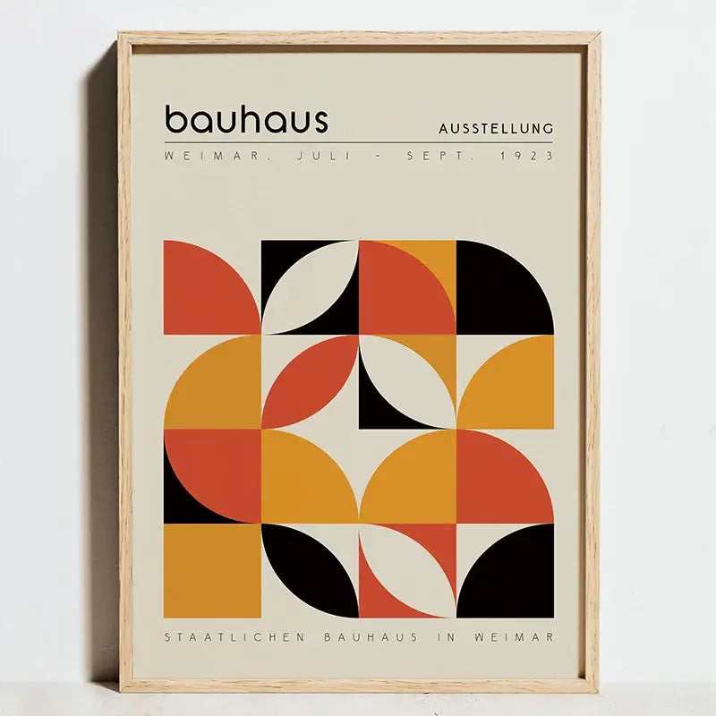 A framed DecorBites modern bauhaus exhibition poster with bold orange black and cream geometric shapes on off-white canvas