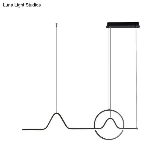 Black minimalist pendant ceiling light with wave-like wire design and circular accent providing warm white light