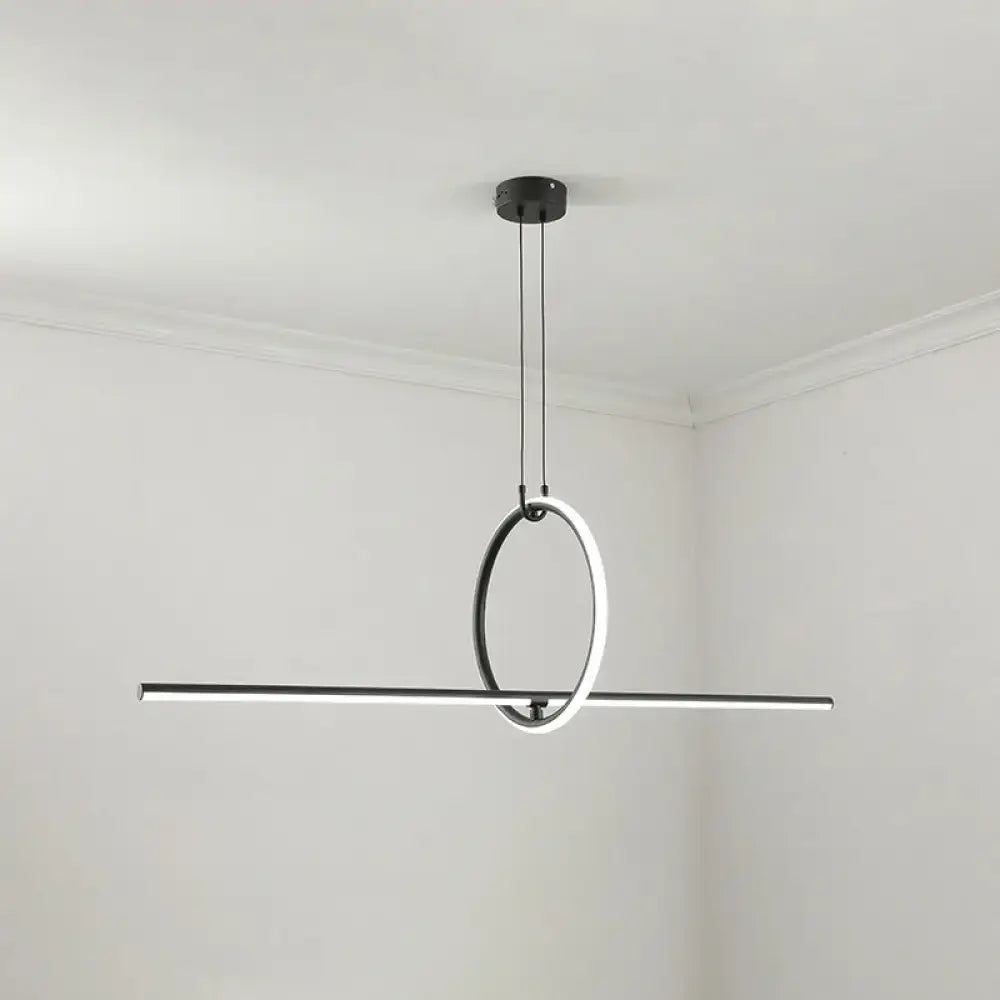 DecorBites modern black metal led pendant with sleek circular ring intersecting horizontal bar for dining room island