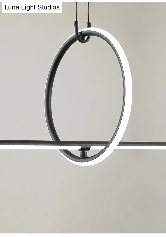 Modern black metal led pendant lamp with circular design and white glowing ring for dining room island lighting
