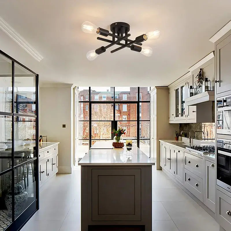 Black wrought iron DecorBites™ modern chandelier flush mount with four exposed bulb fixtures in a semi flush mount design
