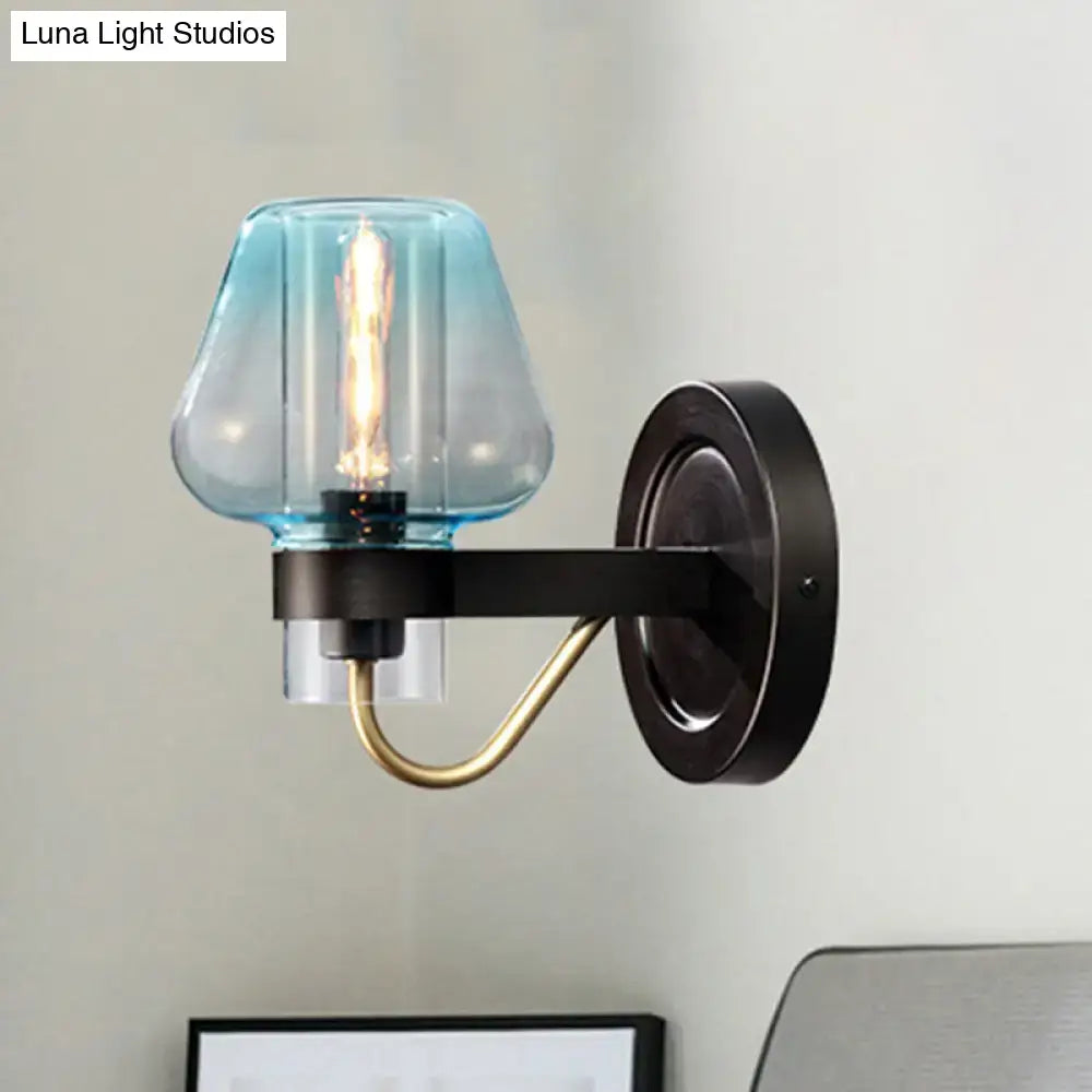 Modern blue glass light fixture with tapered shade and black metal base for shade bedroom wall lighting