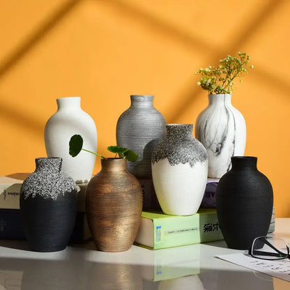 A collection of decorbites™ modern ceramic nordic vases in earthy tones for stylish home decor display