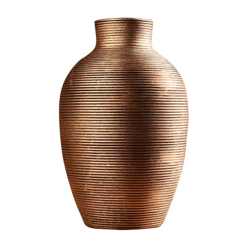 Bronze-colored ceramic nordic vase with textured ribbed surface and narrow neck for modern home decor by DecorBites™