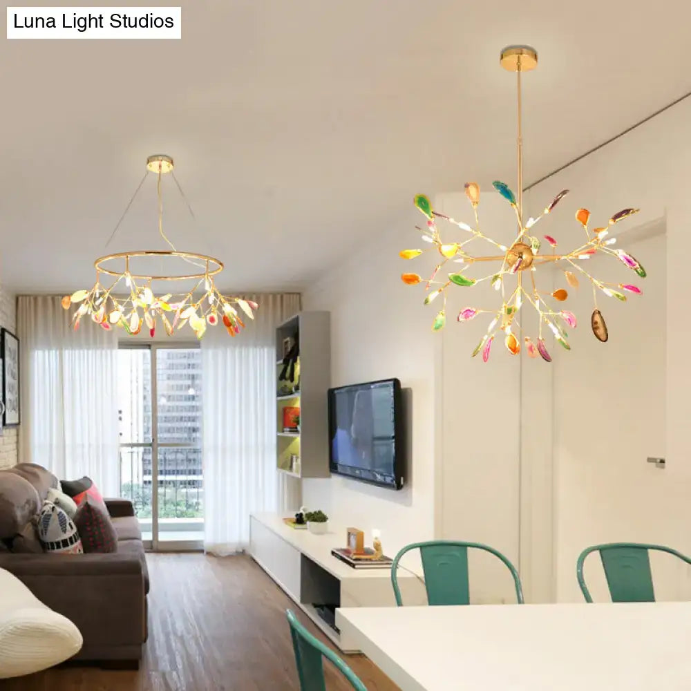 Colorful island light fixture with agate stone pendants and gold-toned frames offering warm color temperature lighting