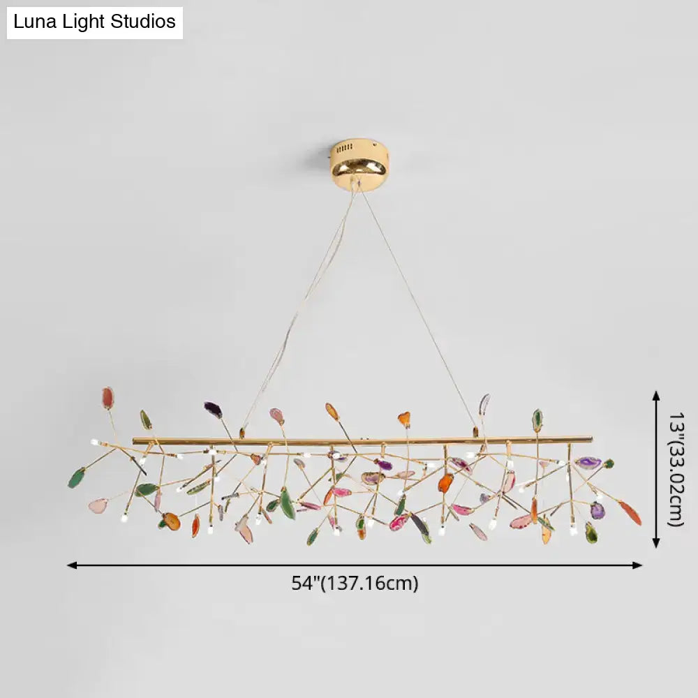 DecorBites modern colorful island light with gold metal frame and leaf-shaped crystals for warm color temperature lighting