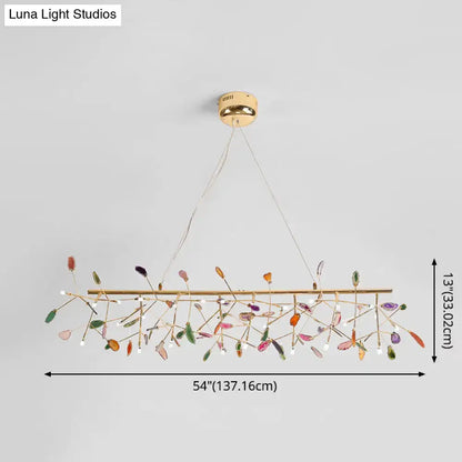 DecorBites modern colorful island light with gold metal frame and leaf-shaped crystals for warm color temperature lighting