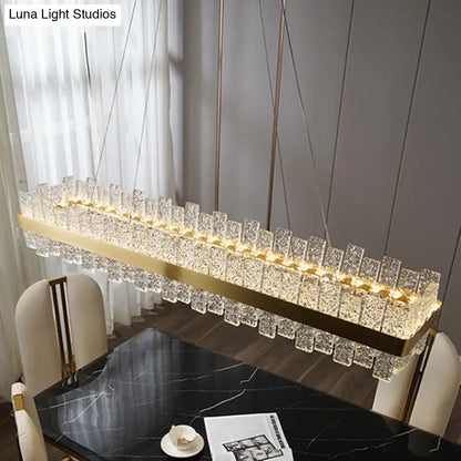 DecorBites modern crystal loop pendant light with brass plated frame and clear faceted crystals for elegant glow