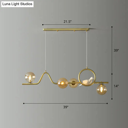 Decorbites modern curve island ceiling light with gold-toned metal frame amber glass globes and ceramic bird figurine