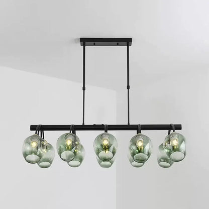 Modern black metal DecorBites island light with six translucent green dimpled glass wine cup shades suspended fixture