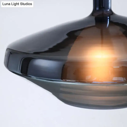 DecorBites™ modern dining room pendant light in dark amber glass features a sleek geometric shade with fixture width and height details