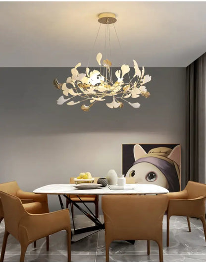 DecorBites™ modern ginkgo leaf LED chandelier with gold-toned metal and white arms for dining room lighting