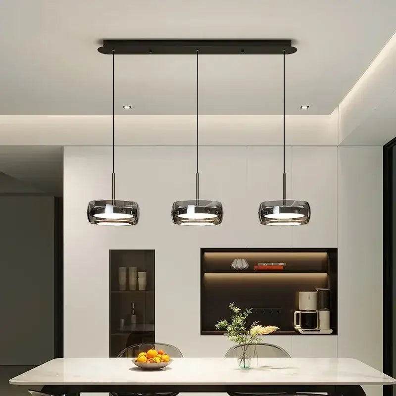 Decorbites modern glass dining table pendant light with sleek black cylindrical glass shades and minimalist ceiling fixture