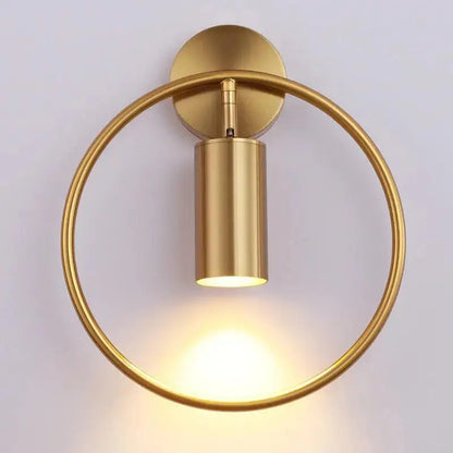 Decorbites modern black gold wall sconce with gold finish circular base and cylindrical light fixture minimalist design wall lamp