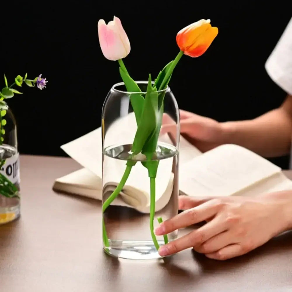 DecorBites modern hydroponic glass flower vase holds pink and orange yellow tulips for home and wedding decor