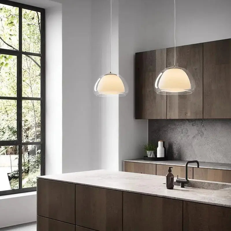 Decorbites modern jelly globe glass pendant light with clear glass domes and warm glow above kitchen island