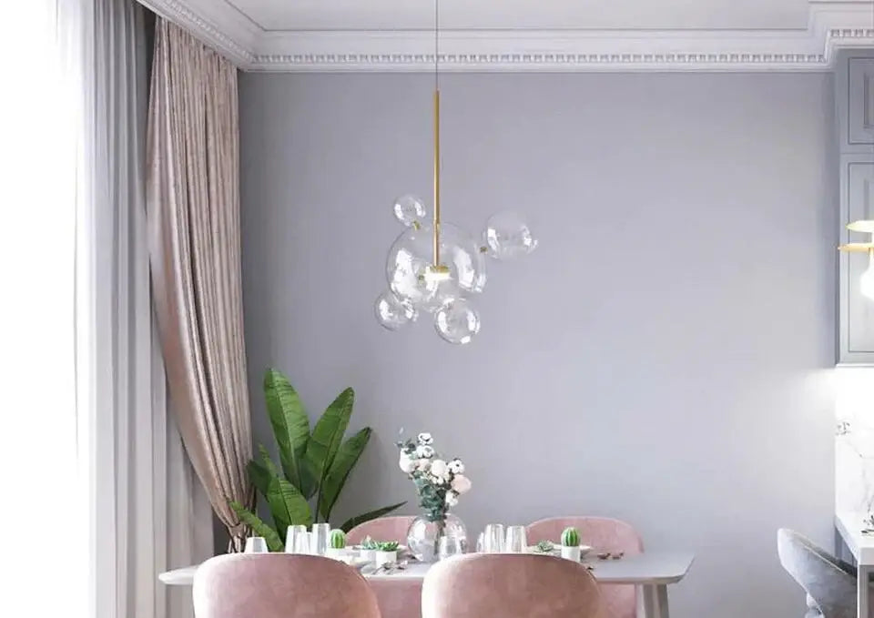 Glass bubble pendant light with gold-toned chain from decorbites™ modern led bubble ball chandelier for living room