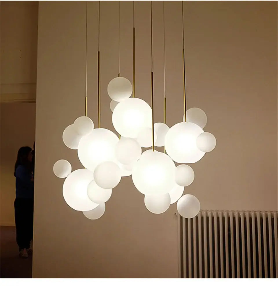DecorBites modern led bubble ball chandelier with frosted white glass orbs and gold rods for living room lighting