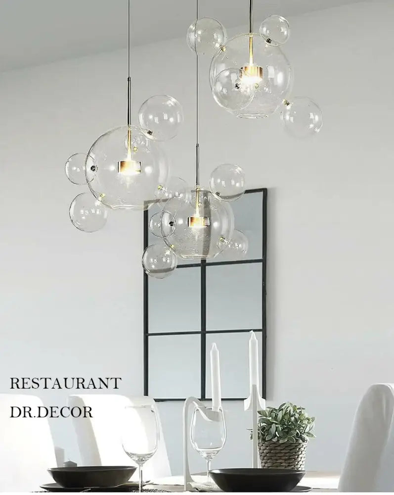 Clear glass bubble pendant lights with gold-toned fixtures in decorbites modern led bubble chandelier for home