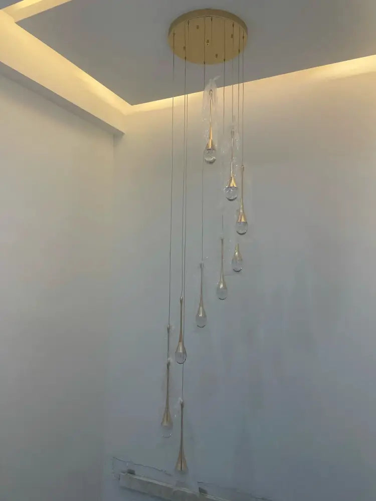 DecorBites™ modern gold-toned led crystal chandelier with clear teardrop glass for elegant home decor lighting