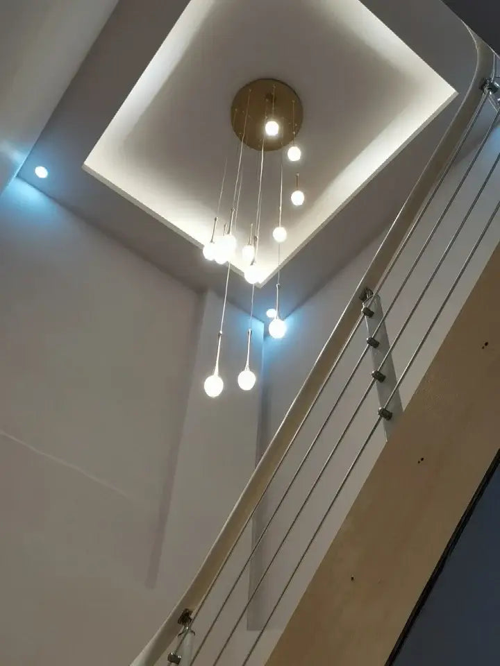 DecorBites™ modern gold-toned led crystal chandelier with multiple spherical bulbs for elegant home decor lighting