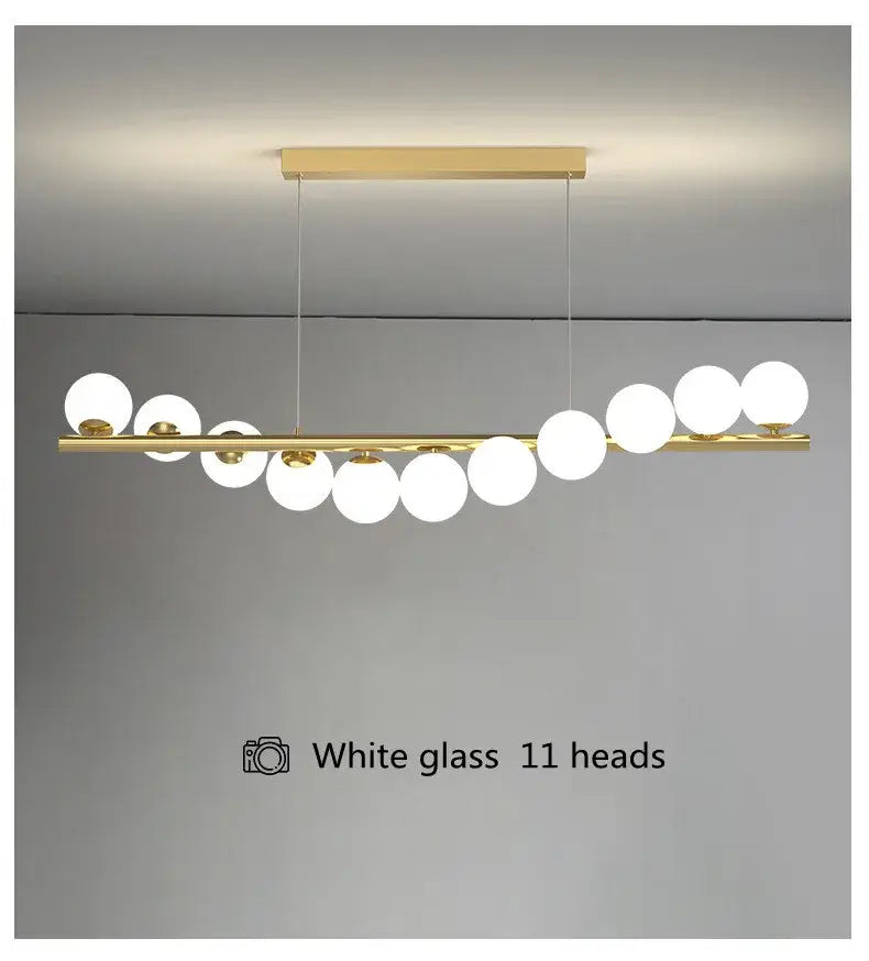 DecorBites modern led glass chandelier with gold-toned bar and eleven white globe bulbs for dining room lighting