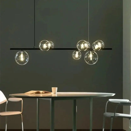 DecorBites modern black metal chandelier with clear glass bubble bulbs and adjustable cord for versatile lighting