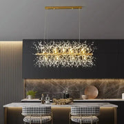 Gold-toned DecorBites™ modern led pendant chandelier with branch-like design and clear crystal accents for home decor