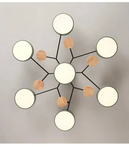Modern macaron ceiling chandelier by decorbites with 3-color dimming features black metal arms and wooden accents