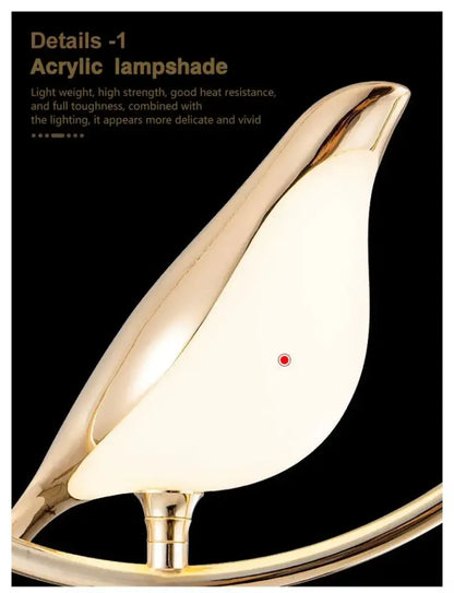Gold-toned acrylic magpie bird led pendant light with smooth glossy curves and subtle red dot by DecorBites™